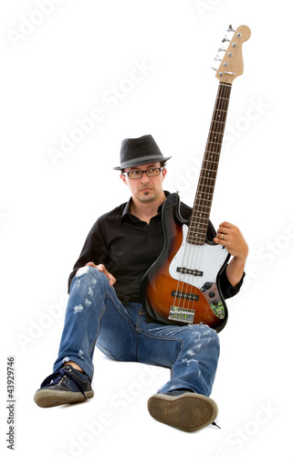 Photo: bassist player sitting bassist player sitting