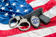 Police badge and gun