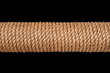 Spool of rope on black