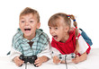 Happy girl and boy playing a video game