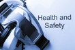 Health and safety register with goggles and earphones