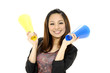 Photo: Close up young woman playing plastic announcement Close up young woman playing plastic announcement