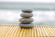 Photo: stones in mat on a background of beach and sea stones in mat on a background of beach and sea