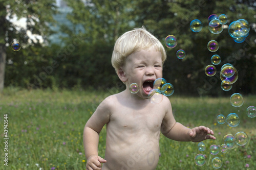 Photo: baby play with soap bubbles baby play with soap bubbles