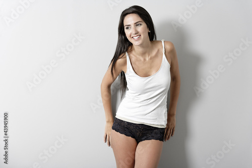 Photo: Woman in white vest top Woman in white vest top