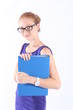 Pretty redhead woman with eyeglasses holding a folder