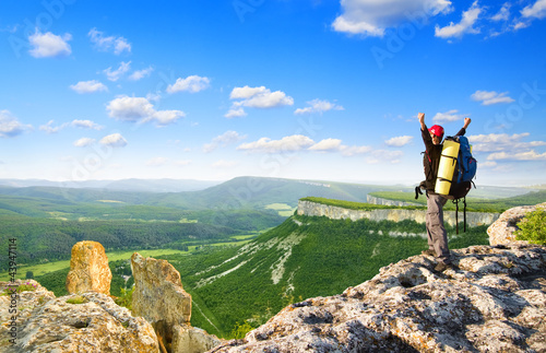 Photo: Man on top of mountain. Man on top of mountain.