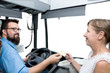 Photo: Busdriver and paying Woman Busdriver and paying Woman
