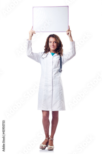 Foto: Woman doctor with blank board Woman doctor with blank board