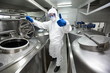 Photo: technician in uniform, in lab with thumb up gesture technician in uniform, in lab with thumb up gesture