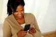 Young afro-american female sending a message
