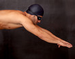 Male swimmer diving
