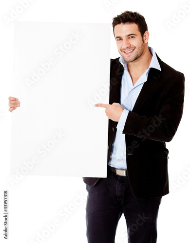 Foto: Businessman pointing at a banner Businessman pointing at a banner