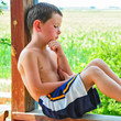 Small Boy Taking a Break on a Hot Summer Day