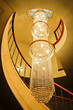 Long chandelier lights up the wall