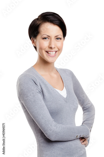 Photo: Smiley young woman, isolated on white Smiley young woman, isolated on white