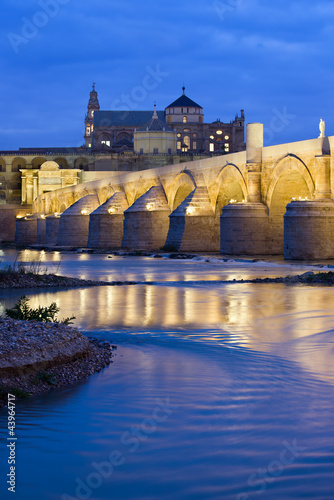 Photo: Roman Bridge on Guadalquivir River at Dawn Roman Bridge on Guadalquivir River at Dawn