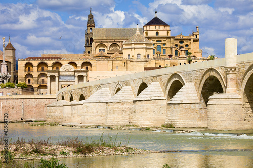 Photo: Mezquita Cathedral and Roman Bridge in Cordoba Mezquita Cathedral and Roman Bridge in Cordoba