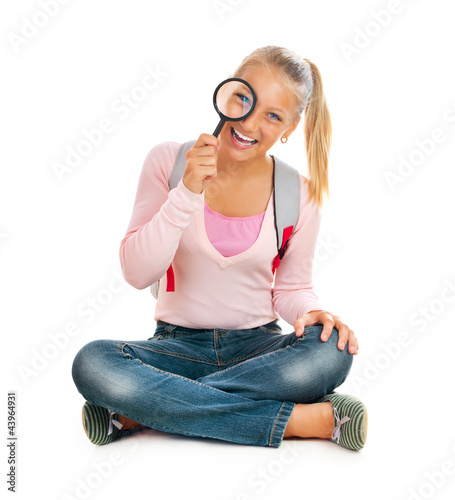 Photo: Schoolgirl or Student with Magnifying Glass. Back To School Schoolgirl or Student with Magnifying Glass. Back To School