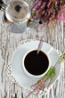 Cup of coffee and heather