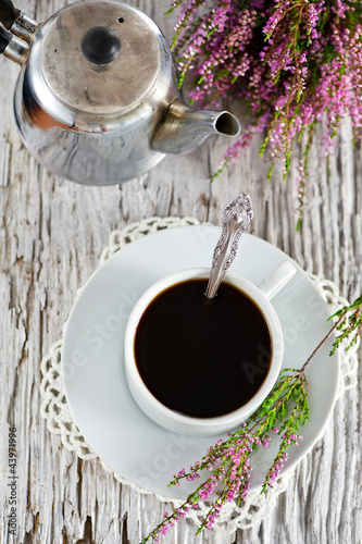 Photo: Cup of coffee and heather Cup of coffee and heather