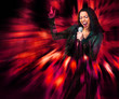 Rock star. Sexy woman singing.