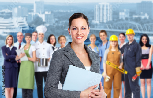 Foto: Business woman and Group of industrial workers. Business woman and Group of industrial workers.