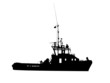 Silhouette of a sea towboat