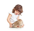 child girl playing and stroking cat kitten