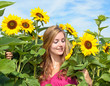 Young, pretty woman with sunflowers