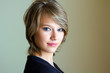 Photo: studio portrait of a beautiful blonde girl with smile studio portrait of a beautiful blonde girl with smile