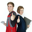 Apprentices for car mechanic and office having thumbs up
