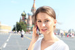 woman talking on the phone in Moscow near the Kremlin