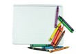 Photo : Colored chalks witch blank paper sheet Colored chalks witch blank paper sheet