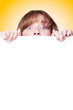 Woman peeking over a blank white placard