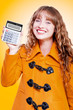 Woman grinning with glee holding calculator