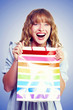 Bargain shopping woman laughing with joy