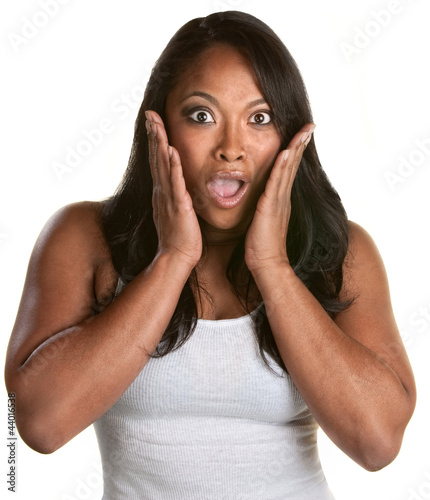 Photo: Surprised Woman with Hands on Face Surprised Woman with Hands on Face