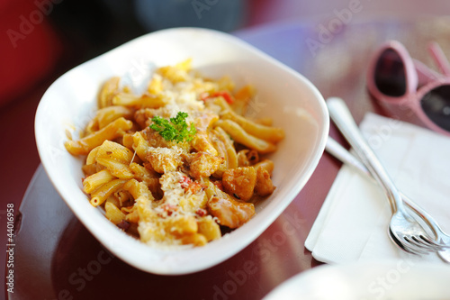 Photo: Italian pasta on white plate Italian pasta on white plate