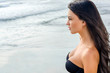 Beautiful girl looking at the sea