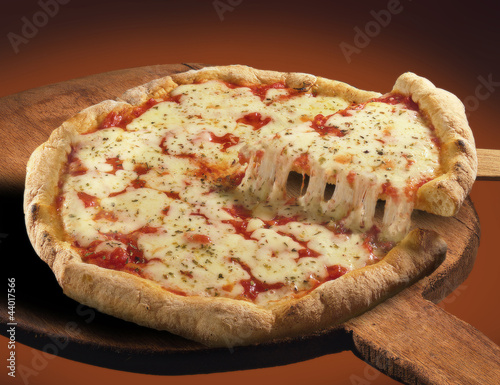 Photo: Pizza su pala di legno Pizza su pala di legno