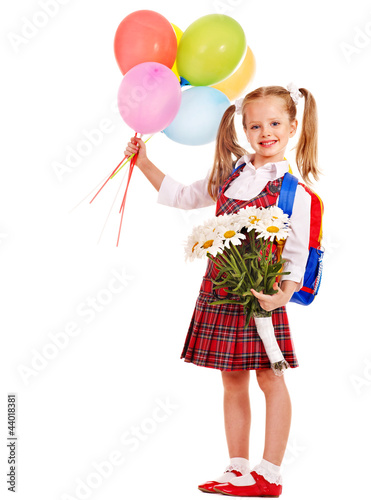 Photo: Schoolchild with flower. Schoolchild with flower.