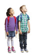 Photo: School boy and girl looking up School boy and girl looking up