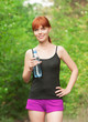 Fitness woman drinking water