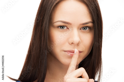 Photo: picture of woman with finger on lips picture of woman with finger on lips