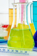 Photo: Laboratory glassware with various colored liquids Laboratory glassware with various colored liquids