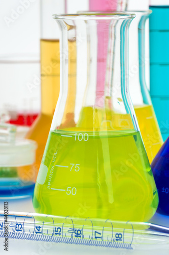 Photo: Laboratory glassware with various colored liquids Laboratory glassware with various colored liquids