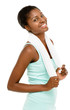 Attractive African American woman holding gym towel white backgr