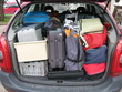 Holiday luggage in a car