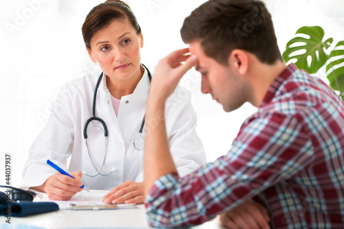 Photo: doctor with male patient doctor with male patient